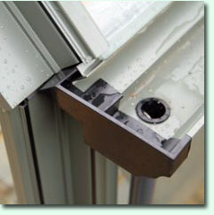 Wide aluminium guttering, complete with PVC downpipe 
